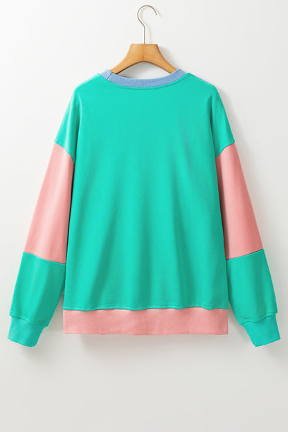 Sweatshirt mit überschnittener Schulter und Patchwork-Muster im Farbblockdesign von Blossom