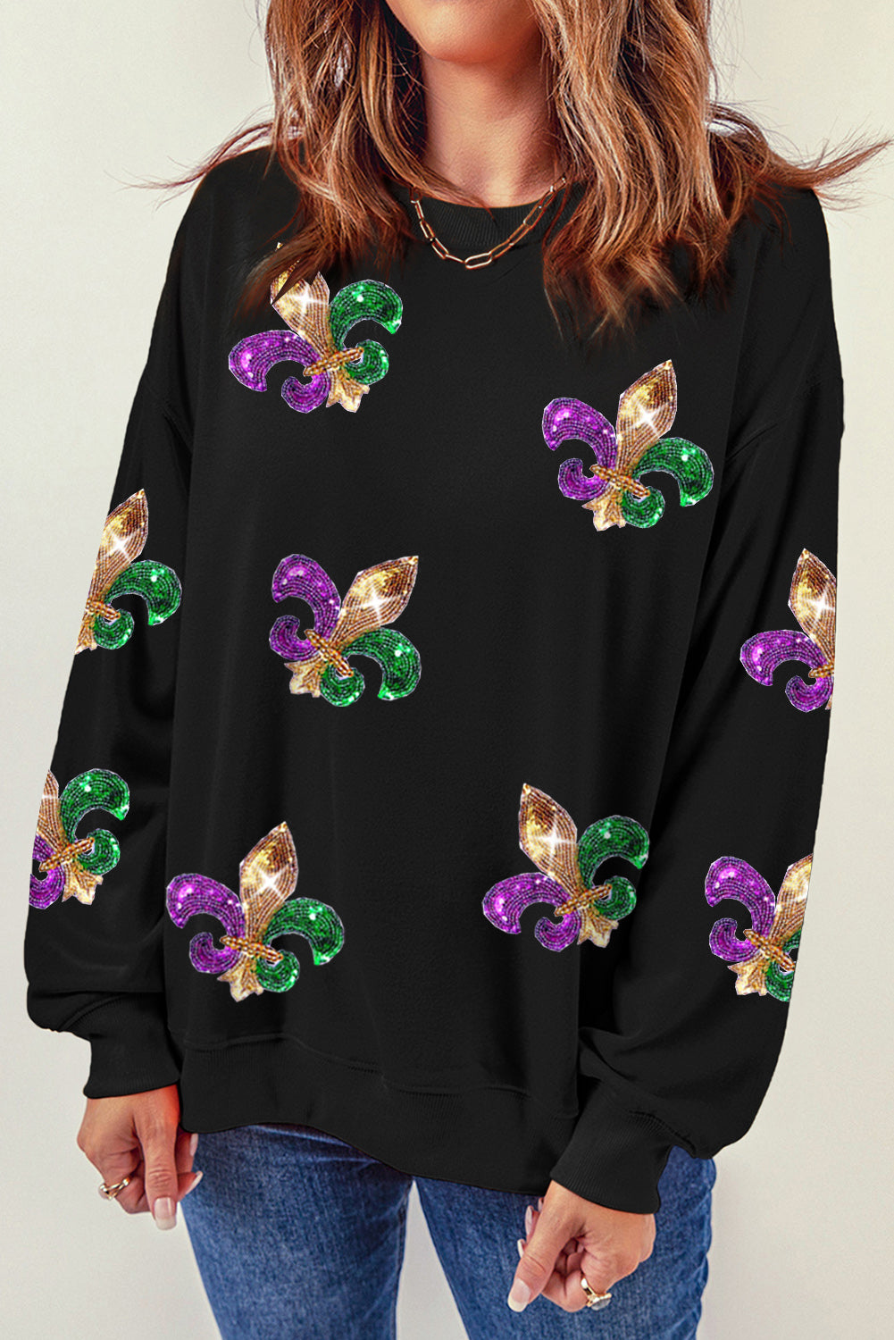 Schwarzes Pullover-Sweatshirt mit Mardi Gras-Grafik und Pailletten