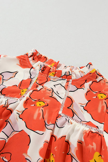 Orangefarbene Bluse mit Blumenmuster, Puffärmeln und Rüschenkragen