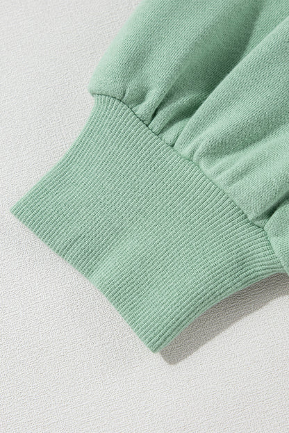 Moonlight Jade – Lockeres Sweatshirt mit Regenbogenstreifen an den Ärmeln und Rundhalsausschnitt