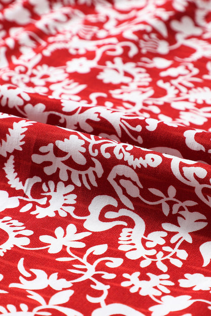 Burgunderrote Bluse mit Blumenmuster und gesmoktem Kragen und Schleife