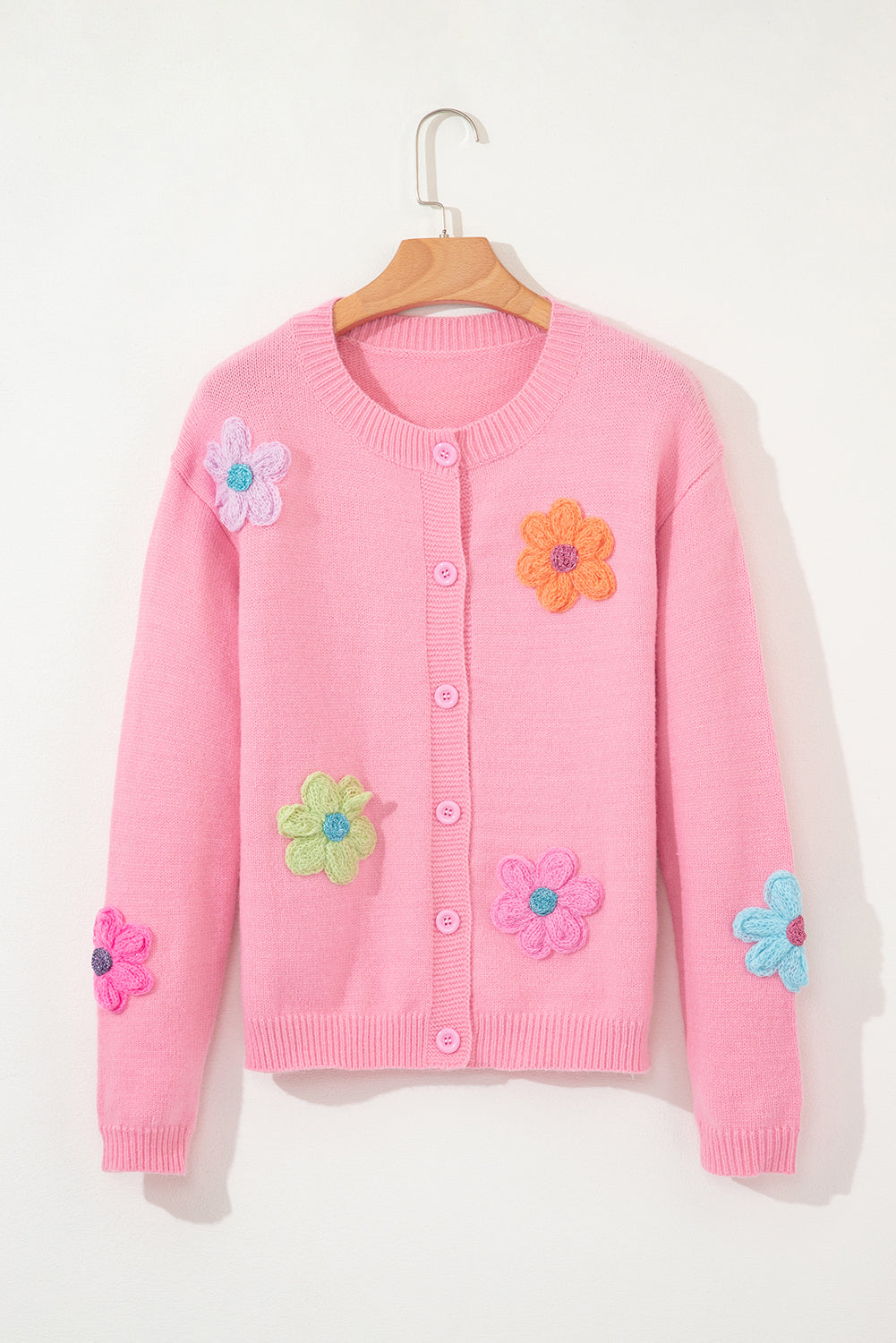 Niedliche Strickjacke mit Blumenmuster in Rosa