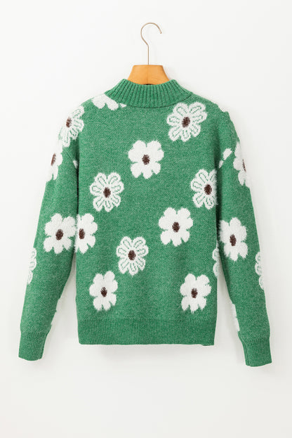 Grüner Pullover mit Blumenmuster und halblangem Reißverschluss sowie überschnittenen Schultern