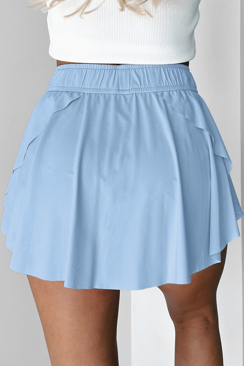 Himmelblauer Tennis-Skort mit Kordelzug und hoher Taille
