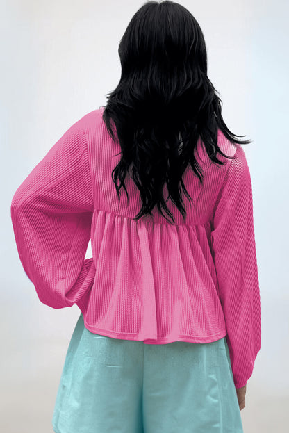Hellrosa Babydoll-Bluse mit Kordel und V-Ausschnitt und Puffärmeln
