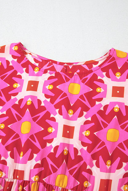 Erdbeerrosa gesmoktes Minikleid mit langen Ärmeln und geometrischem Print