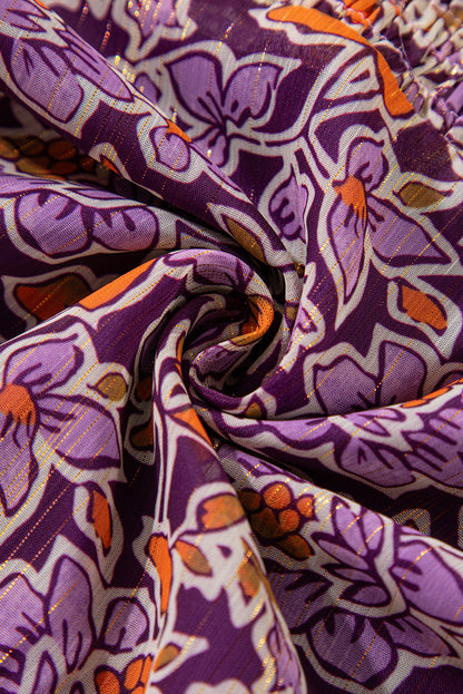 Lilafarbenes Minikleid mit Blumenmuster, gesmokten Puffärmeln und hohem Halsausschnitt