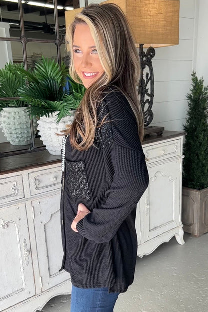 Schwarzes Shacket mit Kordel und aufgesetzter Brusttasche mit Pailletten