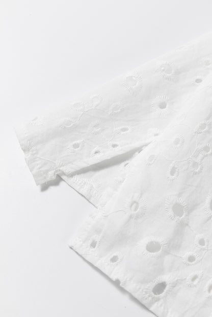 Weiße Bluse mit Blumenstickerei und Puffärmeln