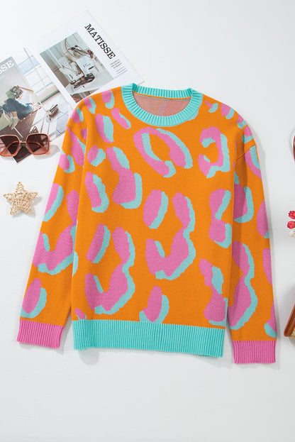 Orangefarbener Pullover mit Leopardenmuster und geripptem Rand im Colorblock-Design