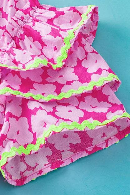 Rosa Bluse mit floralem Kontrastmuster und Zickzackmuster und Rüschenärmeln