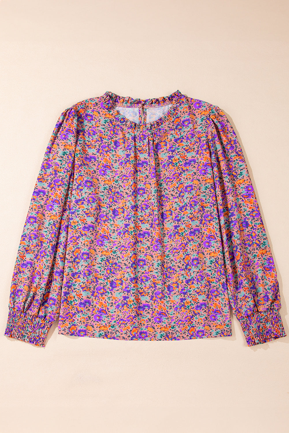 Lila Bluse mit Rundhalsausschnitt, Blumenmuster und gerafften Bündchen