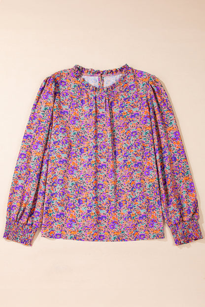 Lila Bluse mit Rundhalsausschnitt, Blumenmuster und gerafften Bündchen