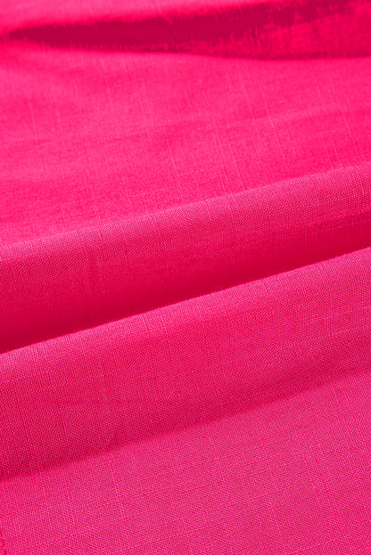 Erdbeerrosa Bluse mit V-Ausschnitt und geometrischer Stickerei, Quaste und Schleife