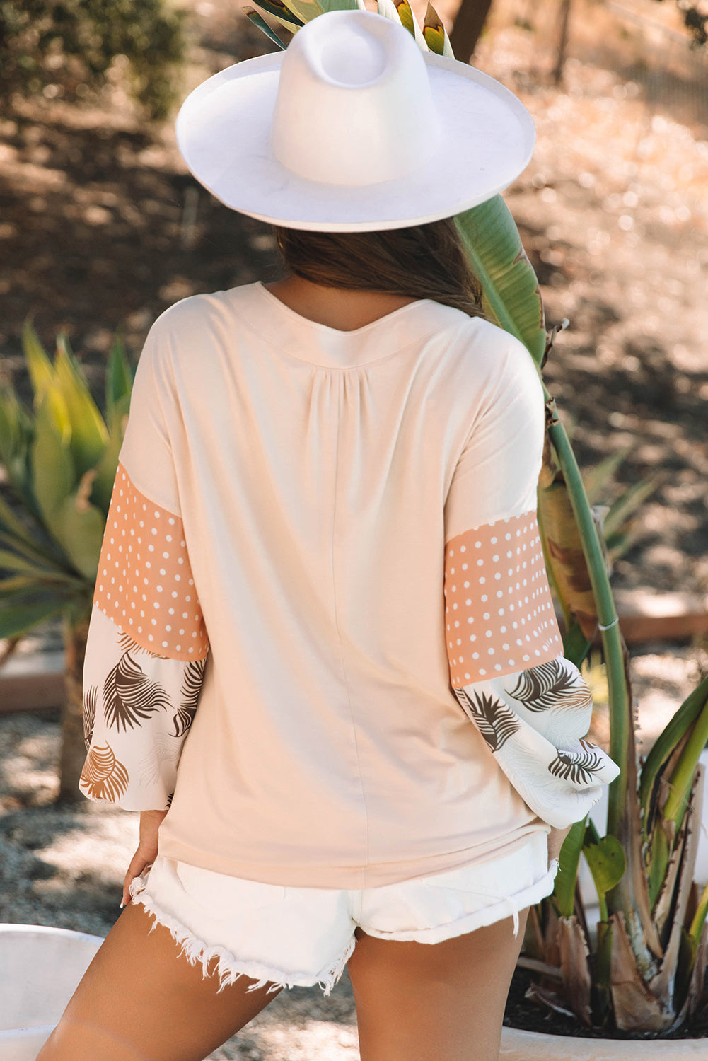 Jet Stream – Lockere Bluse mit Palmenblättern und Punkten, Puffärmeln, Patchwork, V-Ausschnitt
