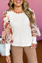 Weißer Pullover mit Blumenaufnähern und Bischofsärmeln