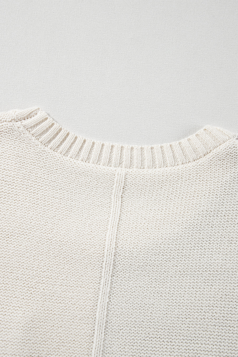 Pullover mit überschnittener Schulter und aufgesetzter Tasche in Colorblock-Optik in Gold Flame