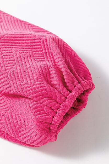 Rosarotes Set aus strukturiertem Oberteil und Hose mit Puffärmeln