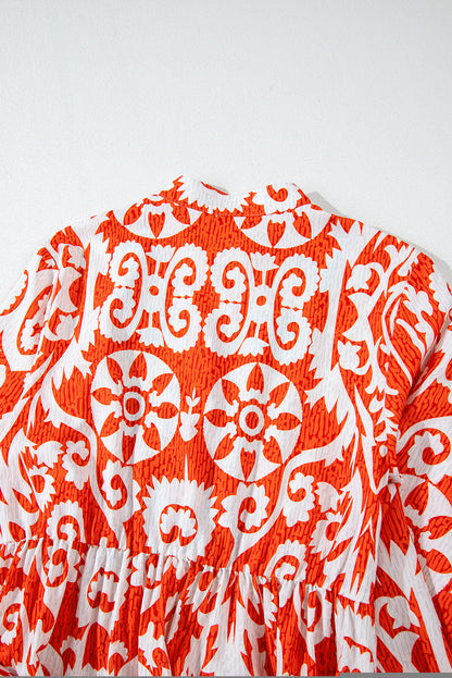 Oranges Boho-Maxikleid mit geometrischem Print und langen Ärmeln