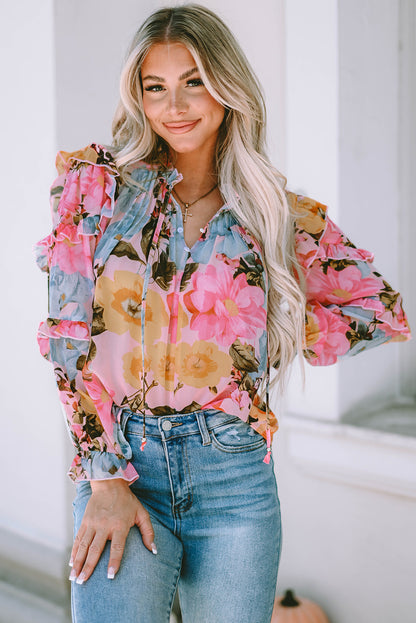 Rosa Bluse mit Blumenmuster und Rüschen