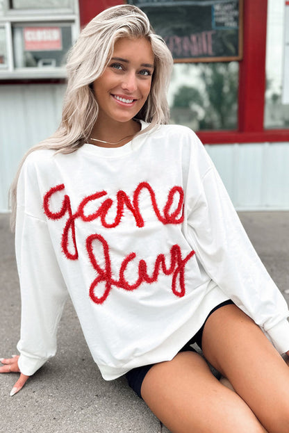 Weißes Lametta-Sweatshirt mit Game Day-Grafik und überschnittener Schulter