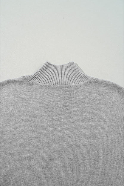 Grauer Oversize-Pullover mit Leopardenmuster und hohem Halsausschnitt und Seitenschlitz