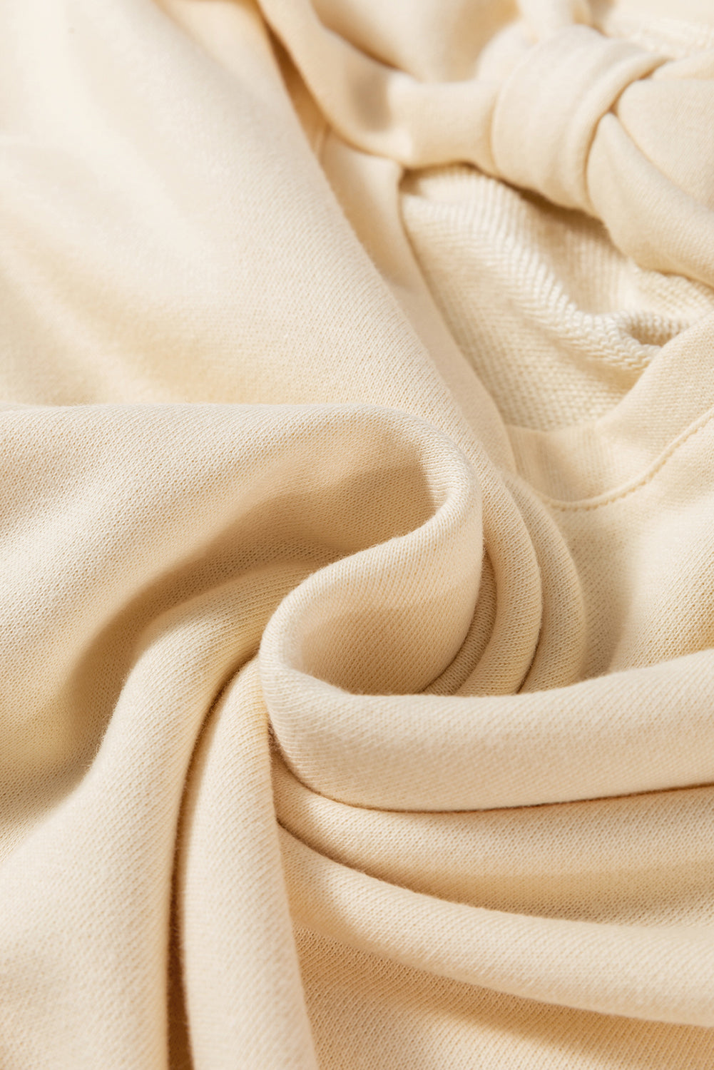Aprikosenfarbenes Sweatshirt mit Rundhalsausschnitt und Schleife