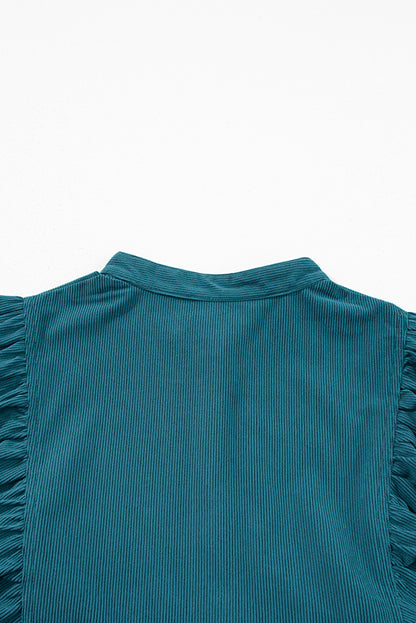 Blaues Cordkleid mit Druckknöpfen und Empire-Taille und Armbandärmeln