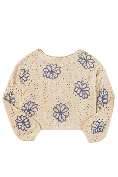 Beigefarbener Pullover mit kontrastierendem Blumenmuster und überschnittener Schulter