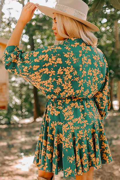 Grünes, fließendes, kurzes Tunika-Kleid mit Blumenmuster und Kordelzug