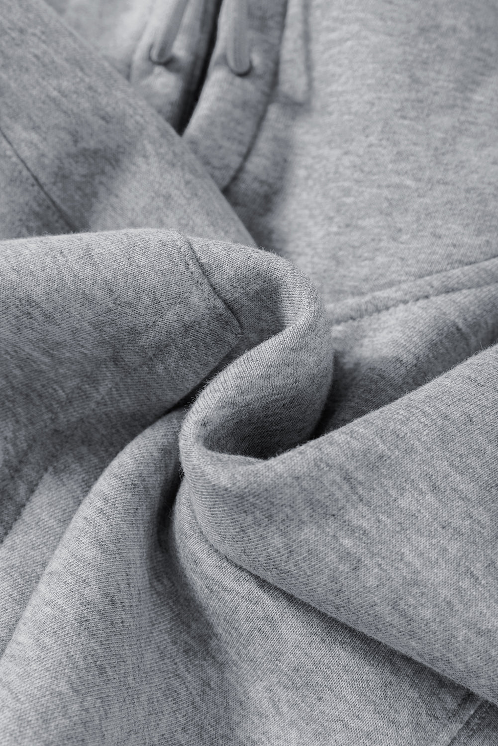 Graues Activewear-Set mit Kapuzenpullover und Jogginghose mit überschnittenen Schultern