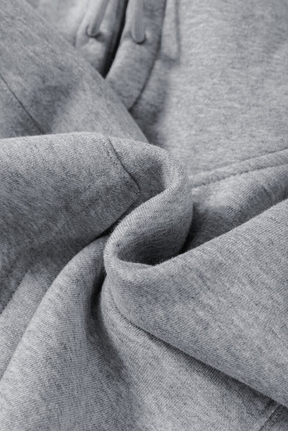 Graues Activewear-Set mit Kapuzenpullover und Jogginghose mit überschnittenen Schultern