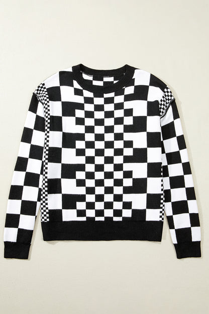 Schwarzer Pullover mit Karomuster und überschnittener Schulterpartie und Rundhalsausschnitt