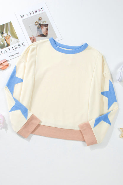 Beiges Oversize-Sweatshirt mit Stern-Patchwork und sichtbaren Nähten