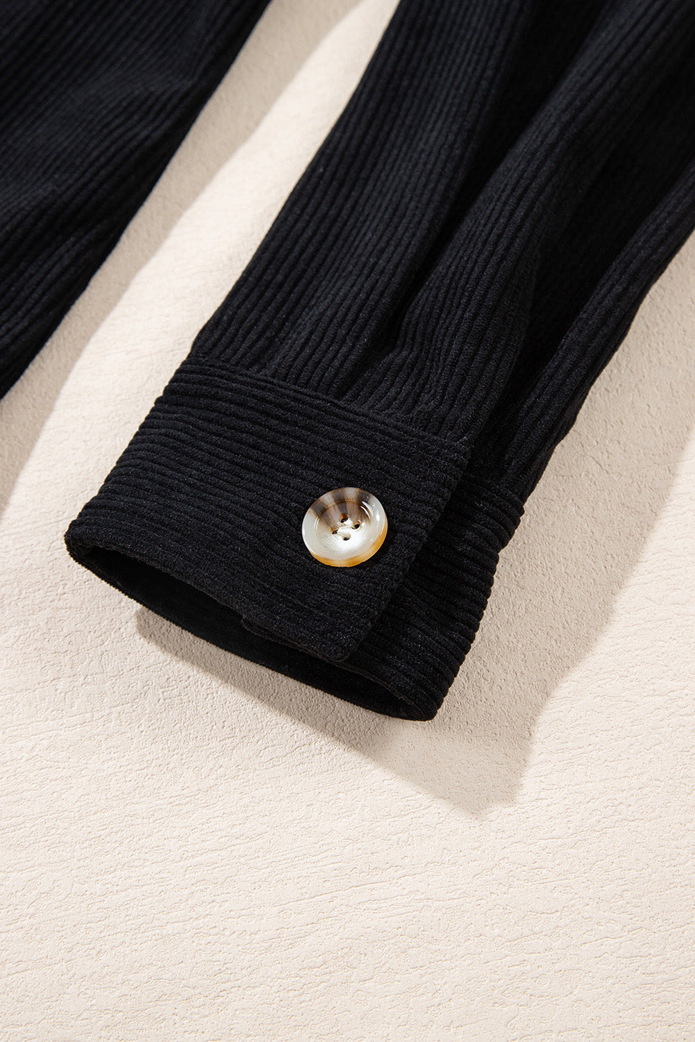 Schwarze Cordjacke mit Kapuze, Kordelzug und Taschen