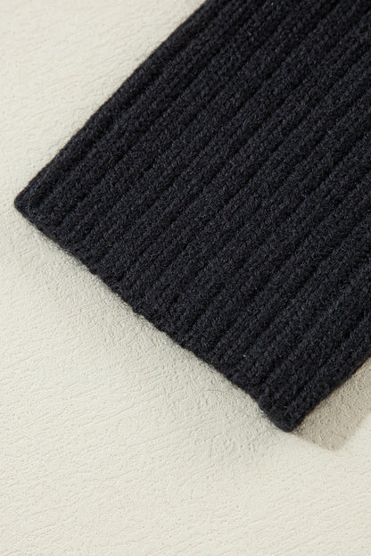 Schwarz gestreifte, lockere Strickjacke mit V-Ausschnitt und überschnittenen Schultern