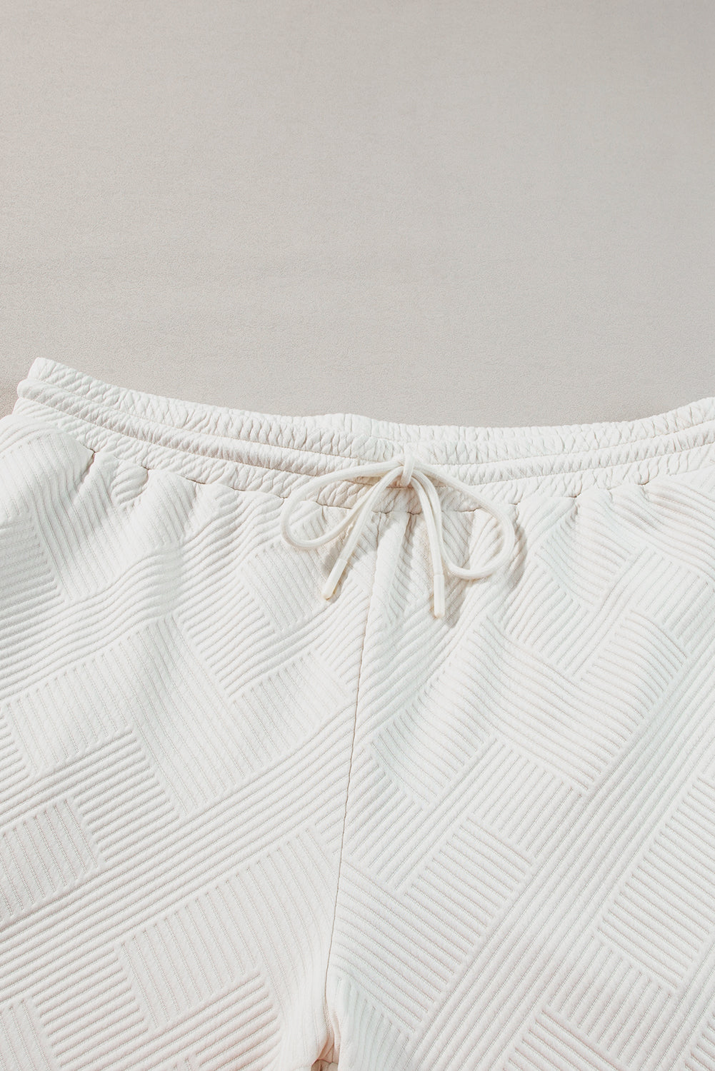 Beiges Plus Size Set aus strukturiertem Oberteil und Hose mit Kragen
