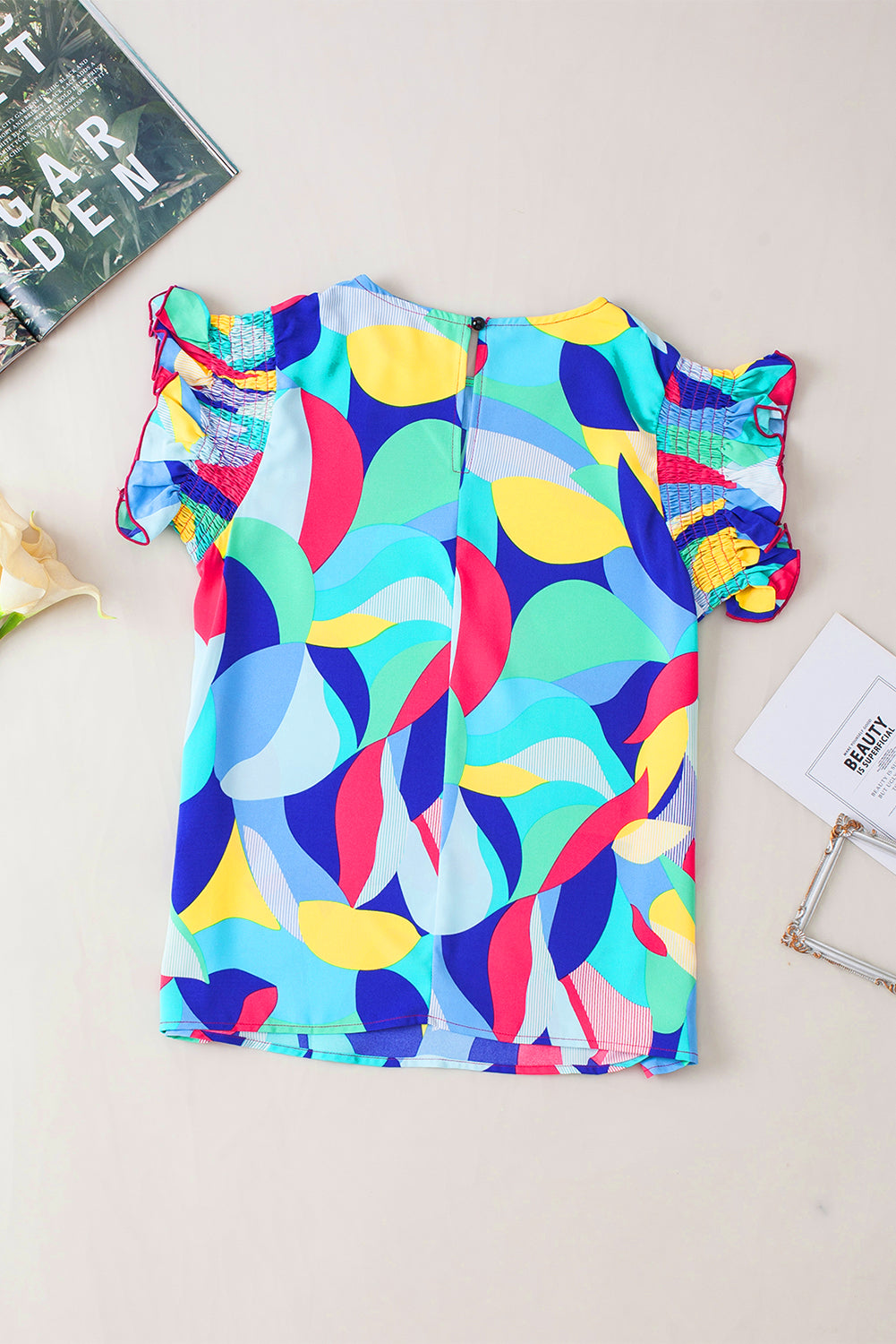 Mehrfarbige Bluse mit abstraktem Print und Rüschenärmeln