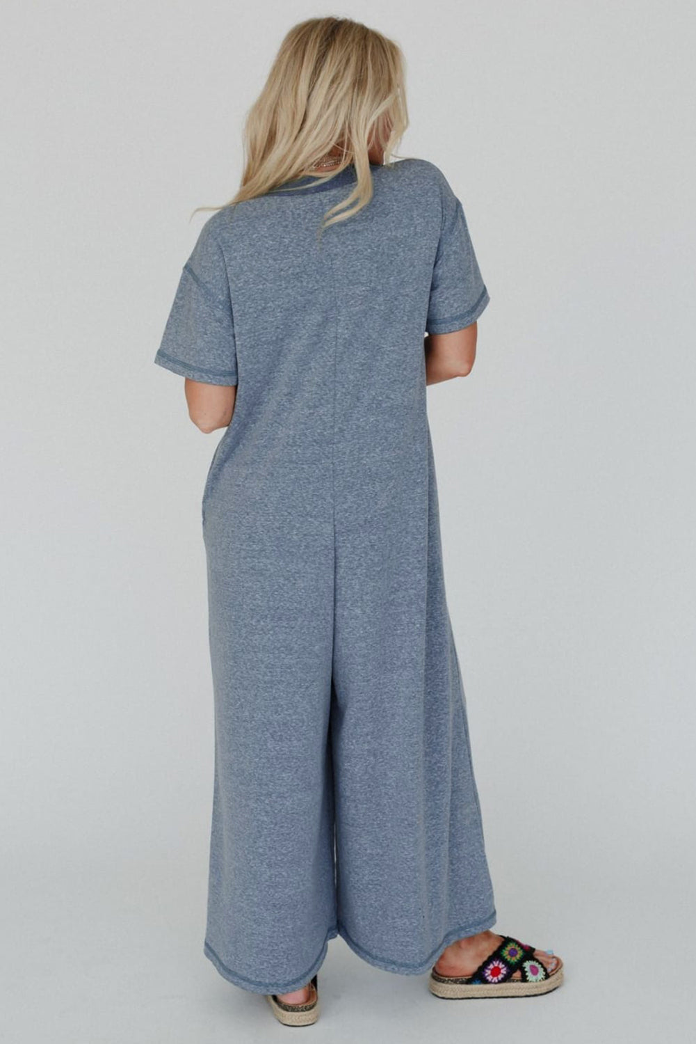 Beau Blue – Jumpsuit mit halber Knopfleiste und Brusttaschen, kurzärmlig und weitem Bein