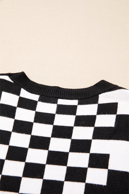 Schwarzer Pullover mit Karomuster und überschnittener Schulterpartie und Rundhalsausschnitt