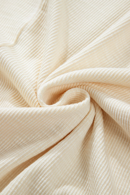 Apricot – Geripptes Oberteil mit Blumen-Patchwork und Puffärmeln in Übergröße