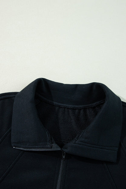 Schwarzes Sweatshirt mit Viertelreißverschluss, Stehkragen und Kängurutasche