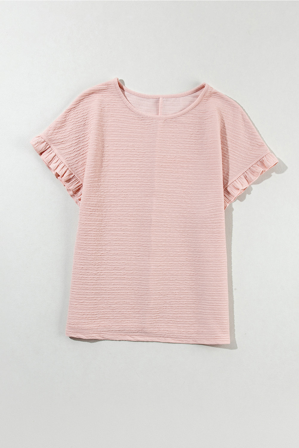 Hellrosa Bluse mit Rüschen und einfarbiger Struktur