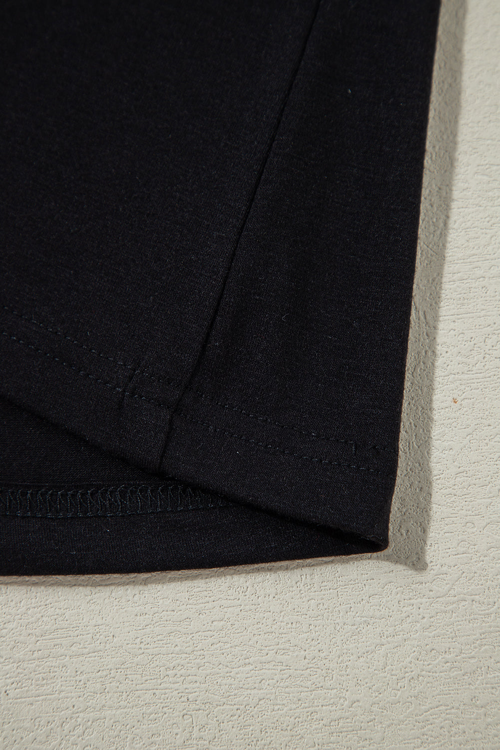 Schwarze Bluse mit transparenter Spitze und Stehkragen und langen Ärmeln