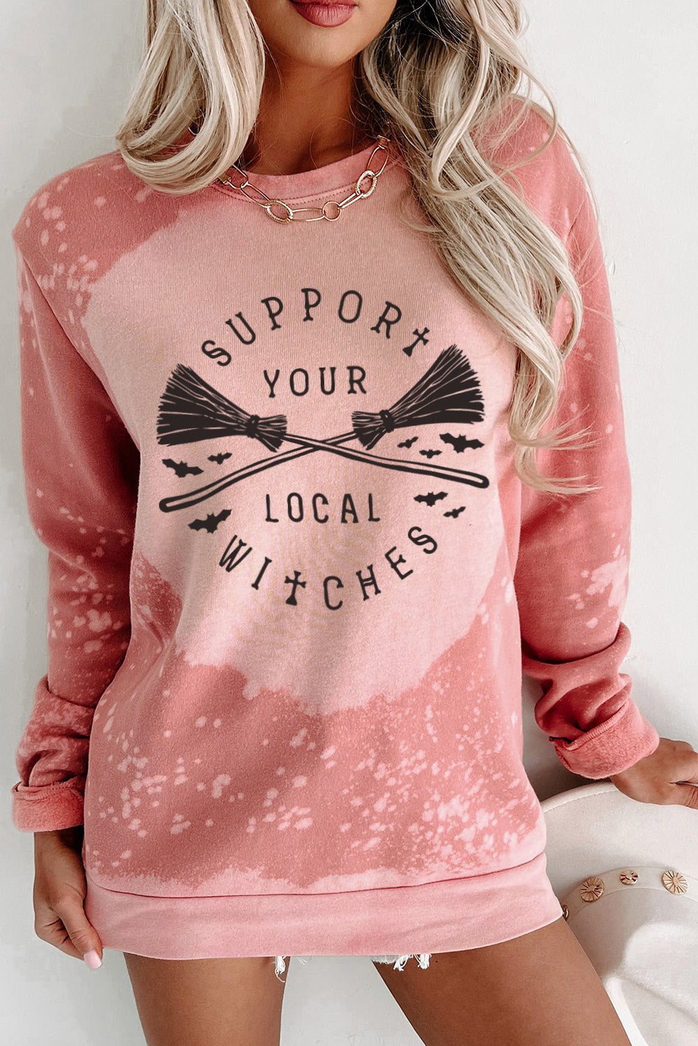 Rosa Halloween Muster Gebleichtes Crewneck Sweatshirt