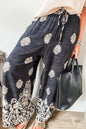 Schwarze Hose mit weitem Bein und Bohemien-Print