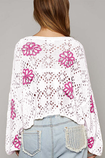 Weißer Pullover mit kontrastierendem Blumenmuster und überschnittener Schulter