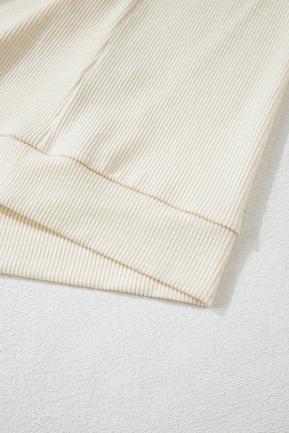 Apricot – Geripptes Oberteil mit Blumen-Patchwork und Puffärmeln in Übergröße