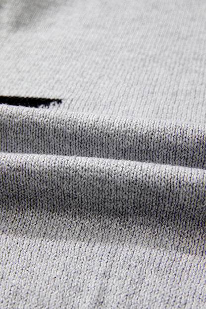 Grauer Pullover mit überschnittener Schulter und Sternmuster