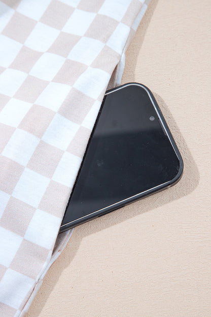 Aprikosenfarbener Jumpsuit mit weitem Bein und Karomuster, Rundhalsausschnitt und Knöpfen